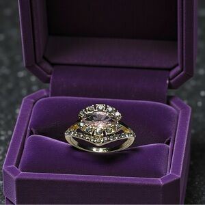 Elegant Purple and Gold Ring with Crystals